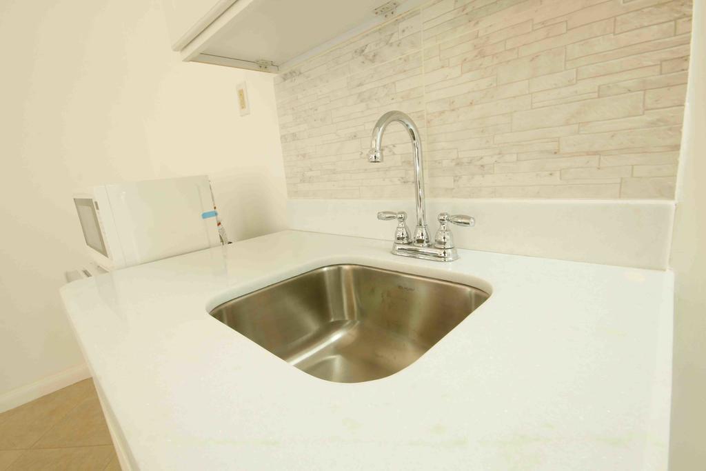 Cattleya Luxury Suites Kingston Pokoj fotografie
